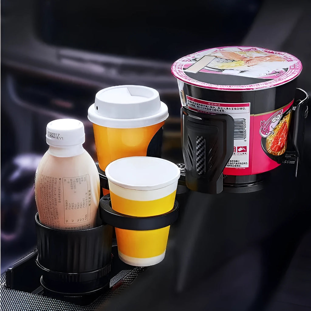 Black carbon fibre finish adjustable car cup holder with retractable base on a car console.
