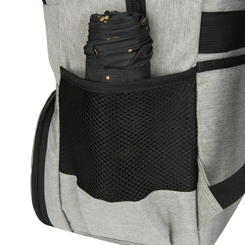 Light grey insulated Oxford cloth backpack with curved shoulder straps, shown with dry-wet separation compartment open.