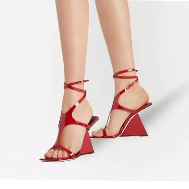 Women's square-toe high-heel sandals with buckle fastening in black colour showing 9.5cm heel