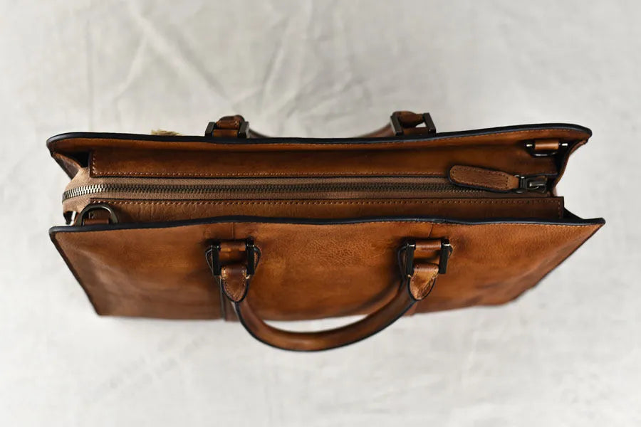Men's khaki vegetable tanned leather horizontal square handbag with zipper