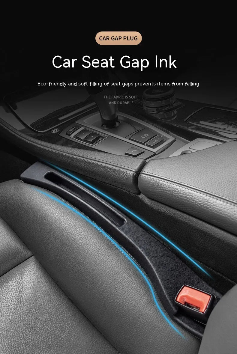 Black plastic car seats gap storage box with handle between driver seat and centre console
