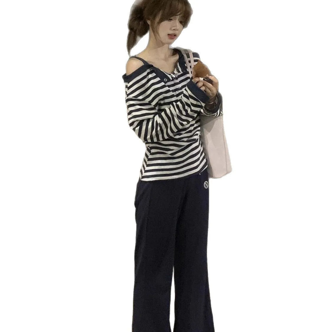 Dark blue Korean-style oversized women's long-sleeve t-shirt with stripe and embroidery detail.