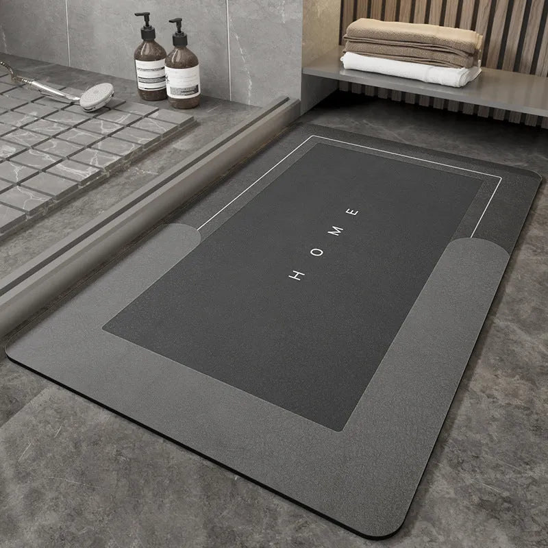 Bathroom floor mat in blue colour, oval shape, showing machine-woven blended texture