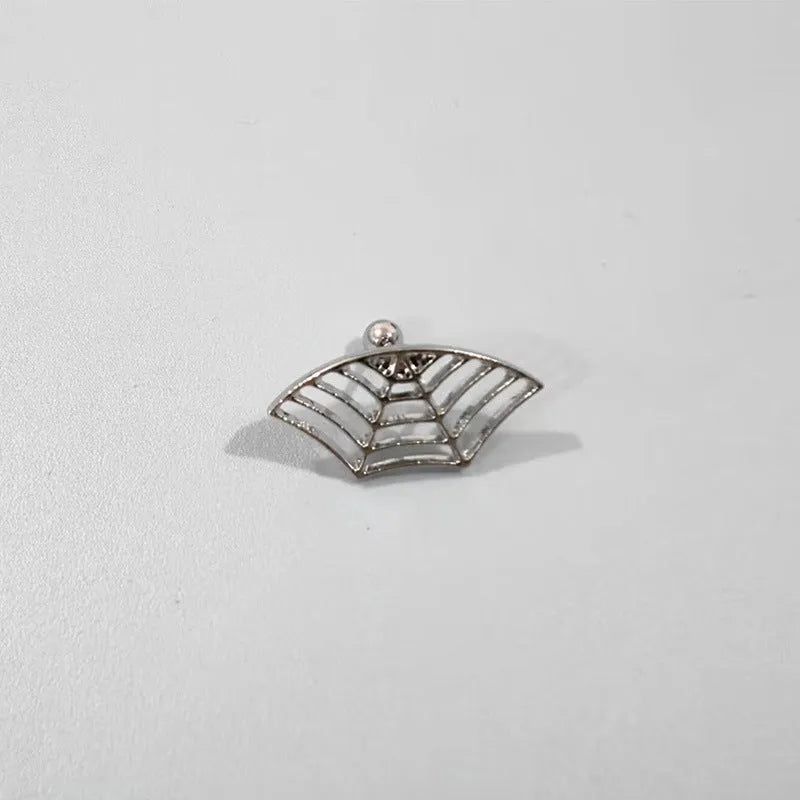 Gold and silver spider web stud earrings with geometric mesh pattern
