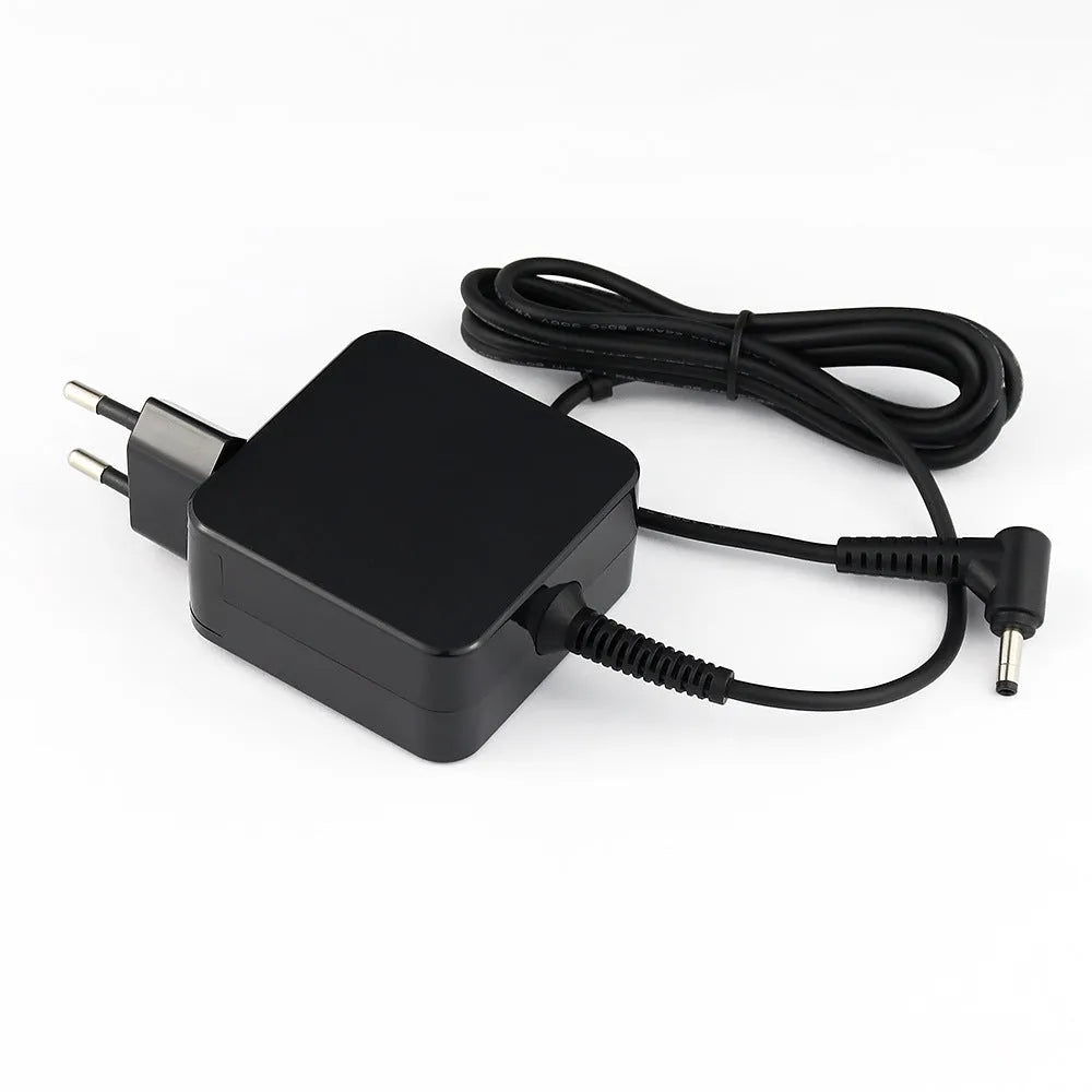 Black 45W laptop adapter with US and EU plugs showing 99.3mm length