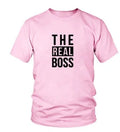 Men's loose-fitting round-neck T-shirt with a graphic print, short sleeves, and a tag showing size label.