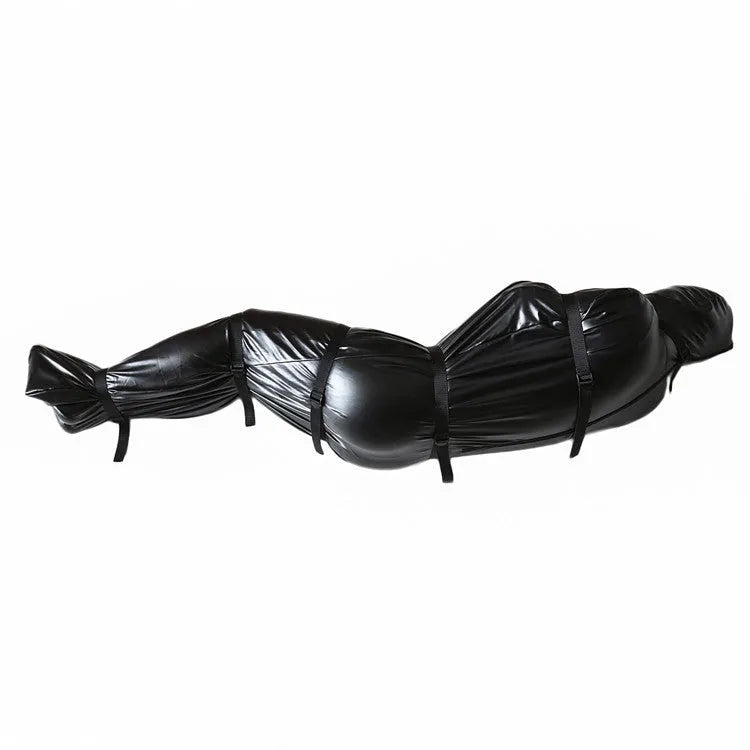 Black patent leather full-coverage body wrap with six ratchet tie down straps laid out.