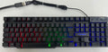 Wired keyboard with six-colour backlit luminous characters on black ABS frame, full-size layout with numeric keypad