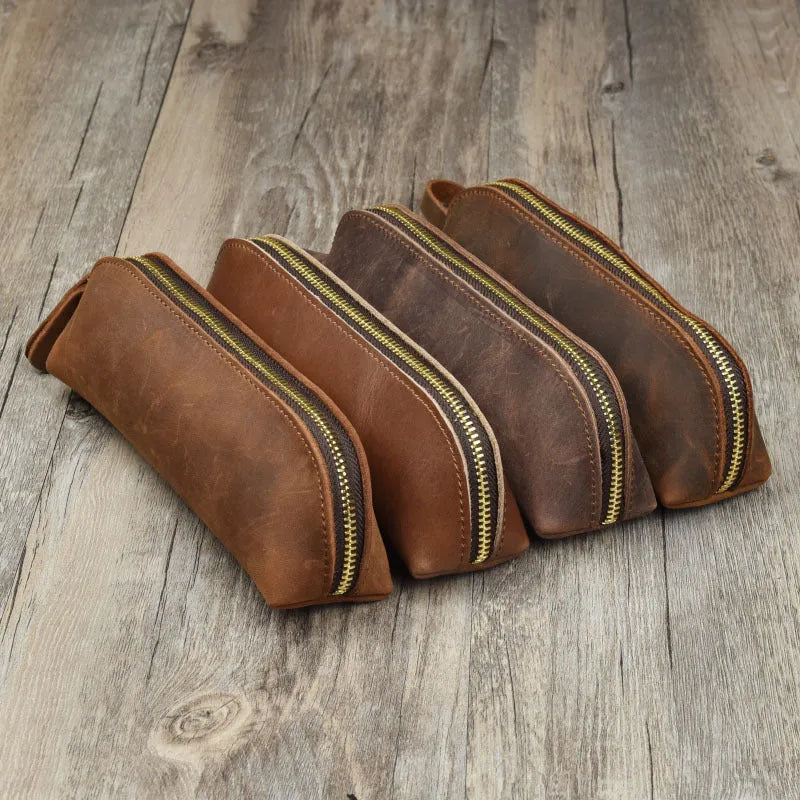 Handmade square leather pencil case with zipper in black, brown, dark brown, or yellow.