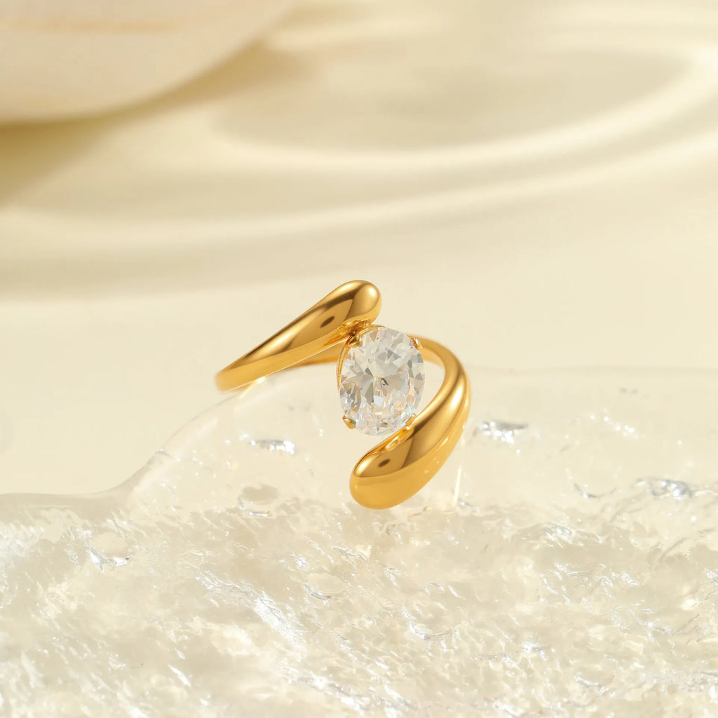 Stainless steel geometric zircon ring with open mouth adjustable design on a woman's hand.