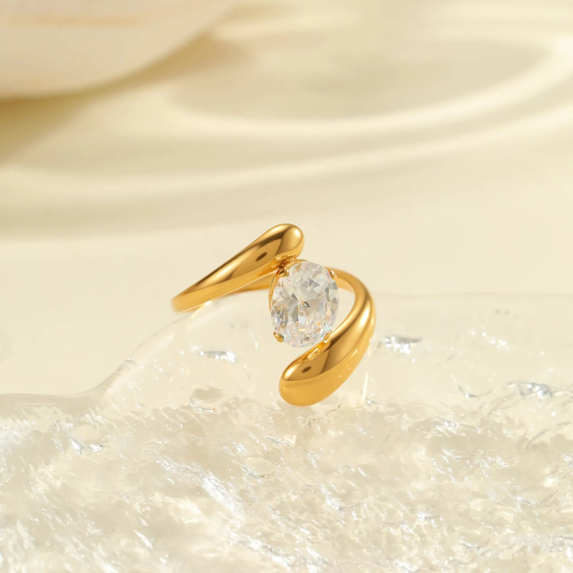Stainless steel geometric zircon ring with open mouth adjustable design on a woman's hand.