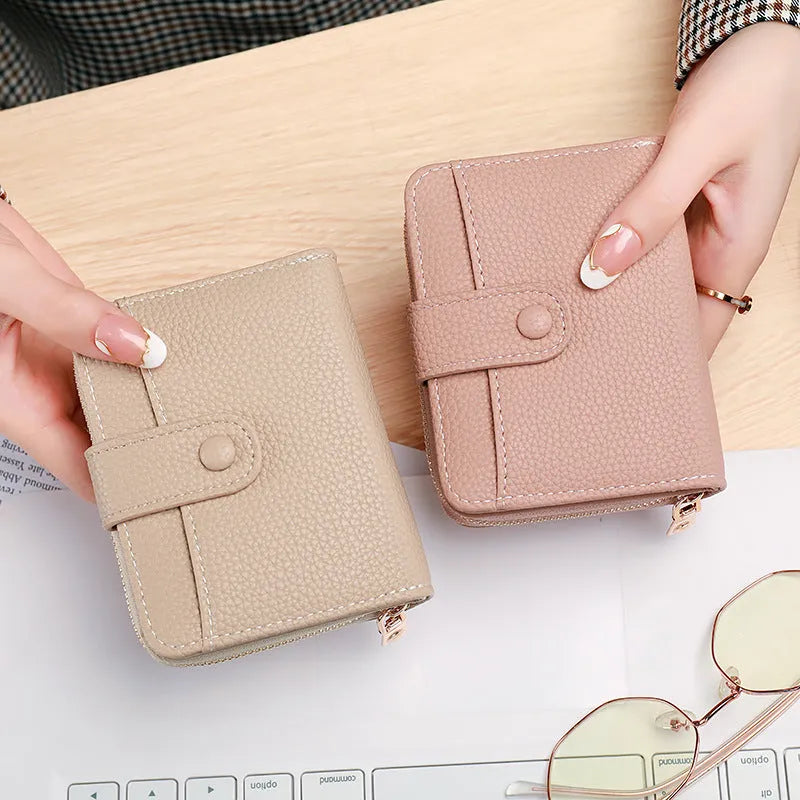 Ladies' short 2-fold wallet in PU leather showing beige, pink, black, and red colour options