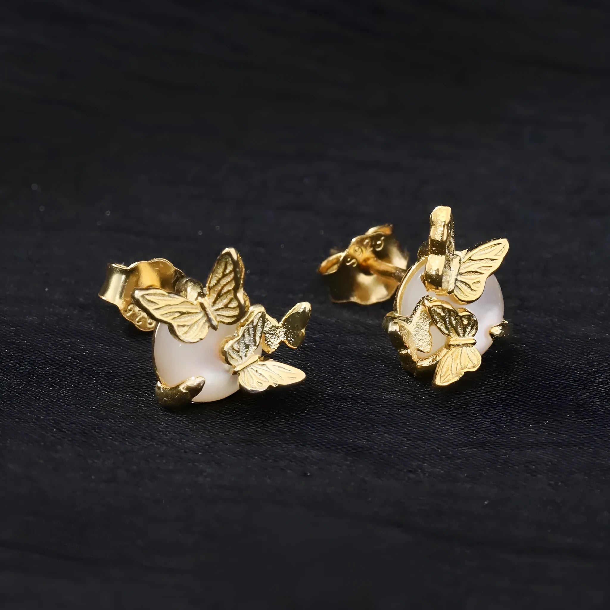 Butterfly design ear studs made from 925 silver with gold or white gold colour electroplating.
