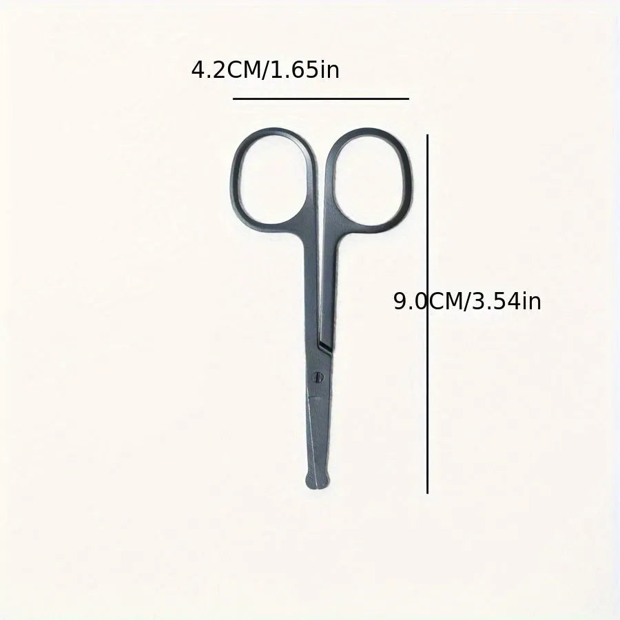 Black pet grooming brush with soft silicone bristles for eye cleaning and comb attachment for hair removal