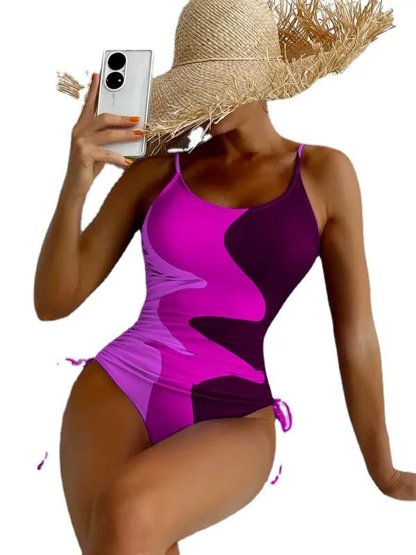 Women's sleeveless one-piece swimsuit in blue, purple, brown or green with fixed swimming trunks