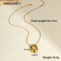 Gold geometric pendant necklace on adjustable chain against white background
