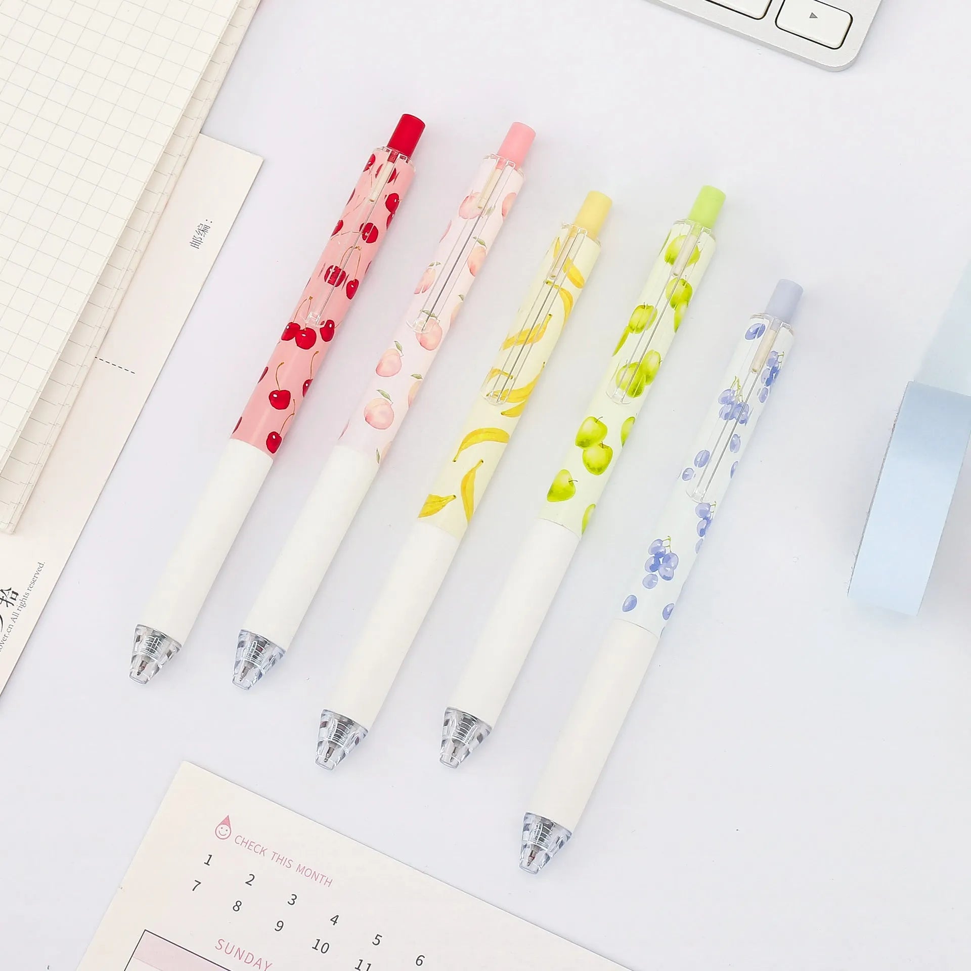 Three scented fruit flavoured pressurised pens with 0.5mm black ink and plastic barrels
