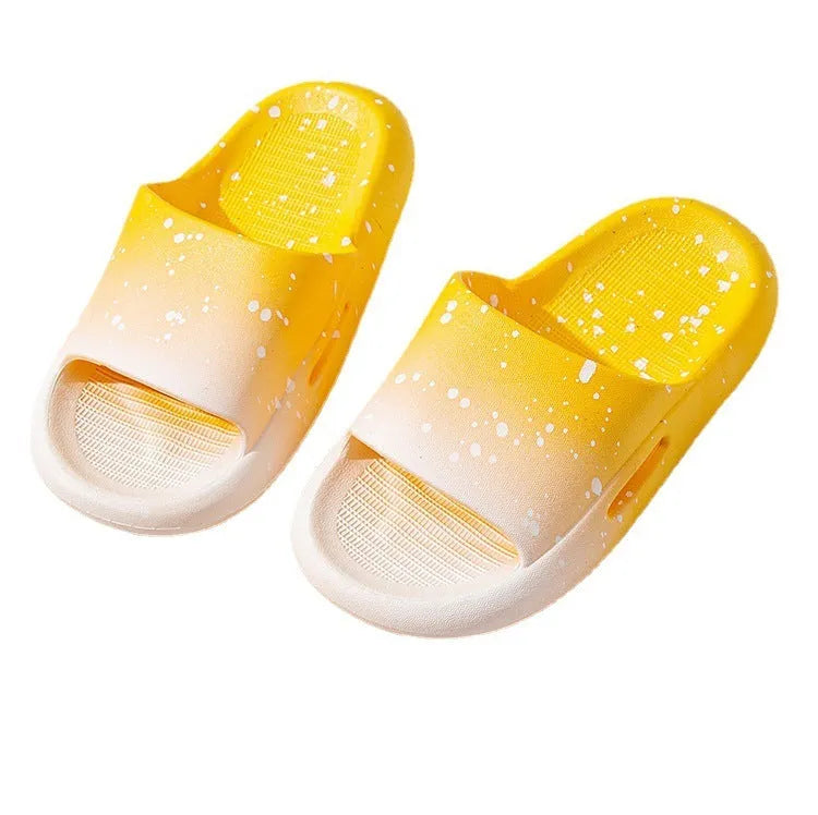Gradient coloured PVC slipper sandals for children on a white background.