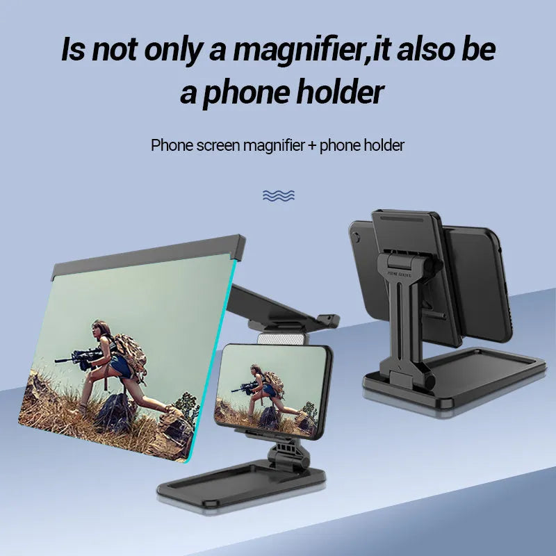 Black folding mobile phone screen amplifier with detachable phone holder on desktop