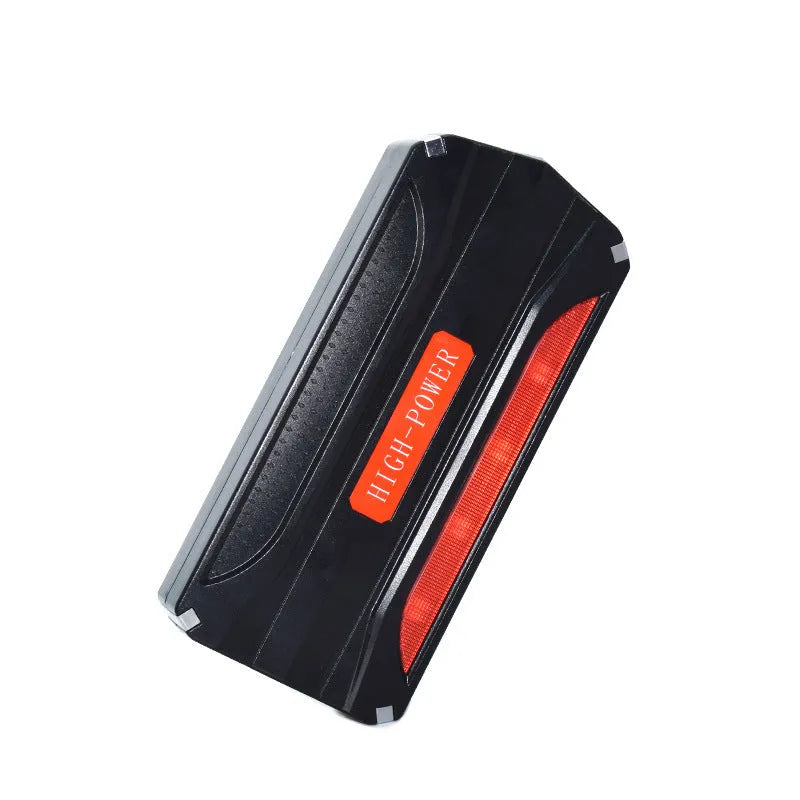 Black and red 12V emergency starting power supply with 7800mAh capacity for vehicle battery jump-starting