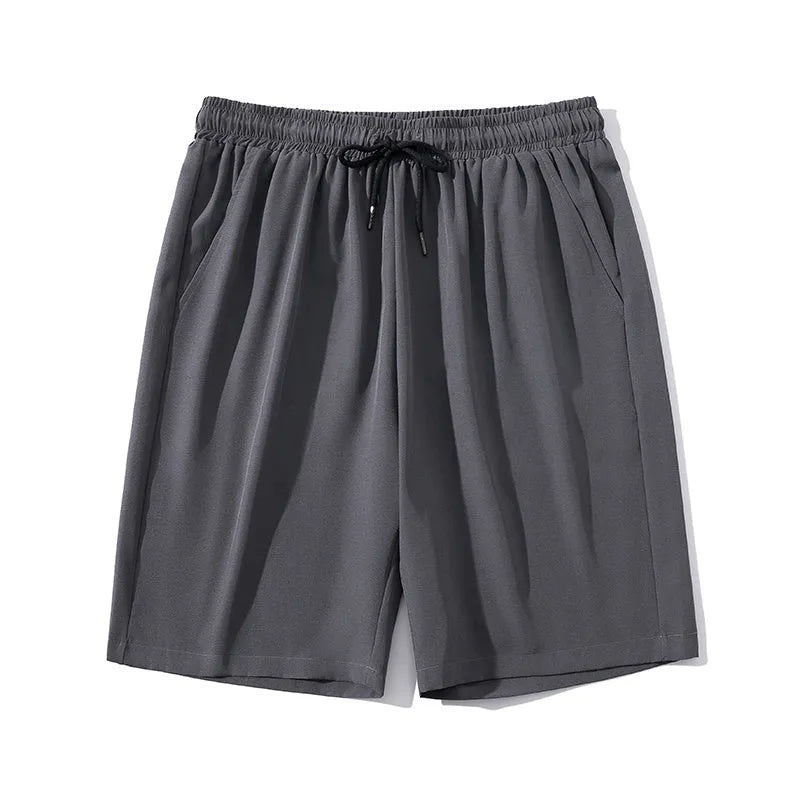 Men's black quick-dry nylon cropped sports pants with elastic waistband and straight-leg design