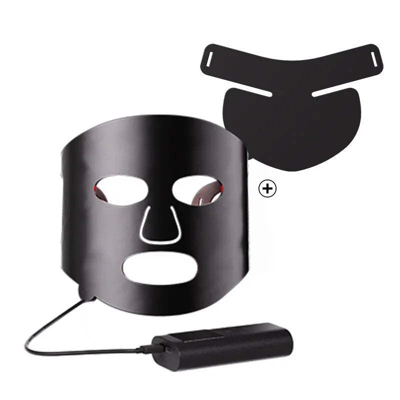 Black and white LED phototherapy face mask with controller for home skin light therapy treatment.