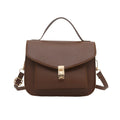 Retro style square messenger bag in PU with a crossbody strap and internal document pocket.
