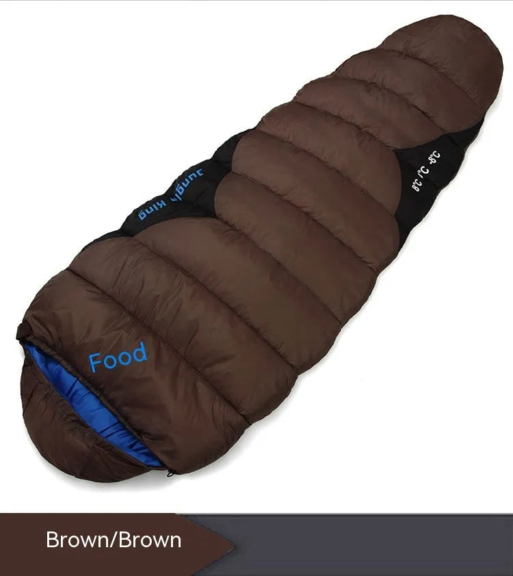 Mummy style camping sleeping bag in a colour option, shown next to its compression sack.