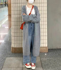 Women's mid-length knitted V-neck cardigan in loose fit with long sleeves