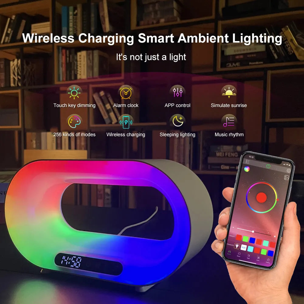 White 3-in-1 LED night light with wireless charger and alarm clock on a bedside table, 23.8cm tall