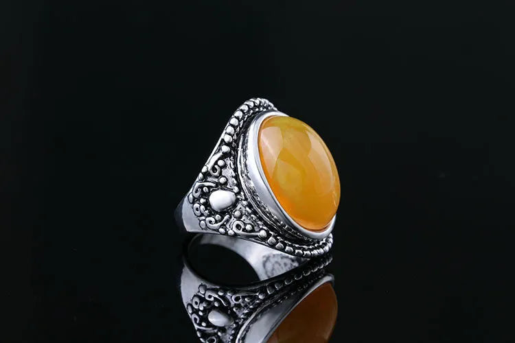 Geometric retro ring in antique silver amber colour with alloy electroplated construction