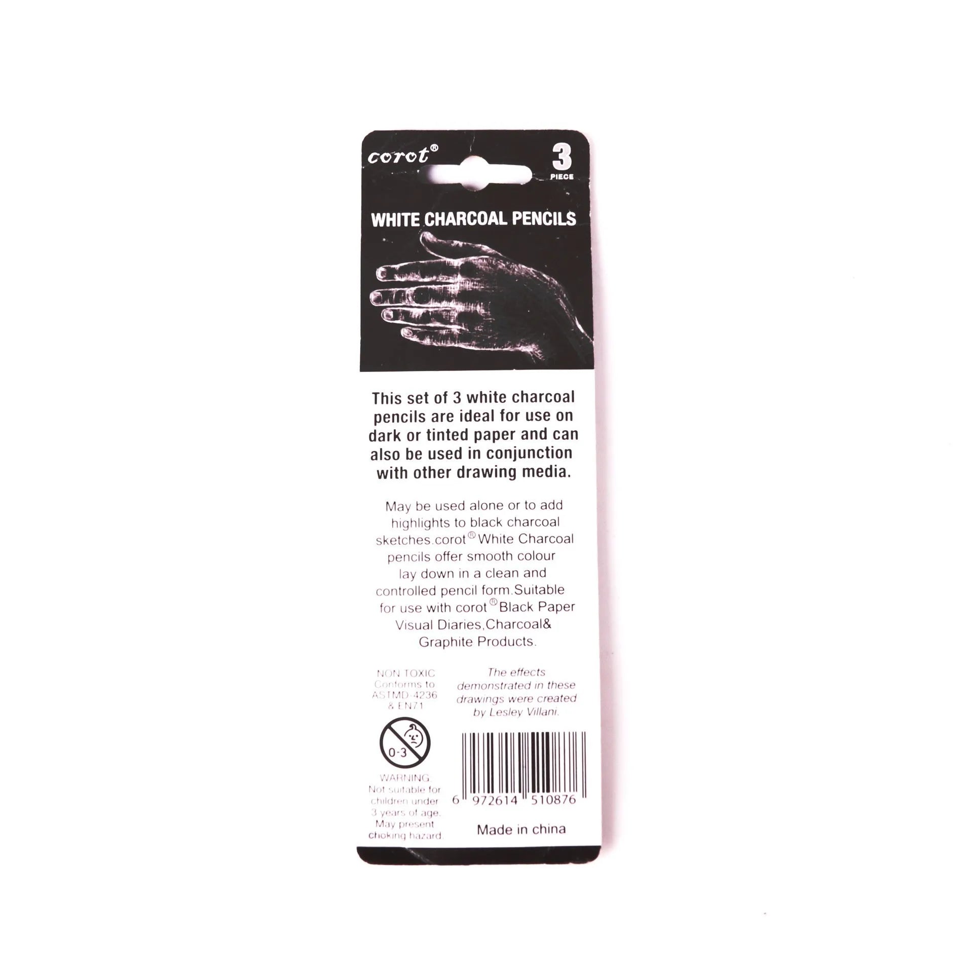 Three white charcoal pencils for sketching and highlighting on dark paper