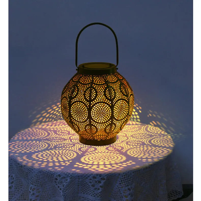 Solar courtyard lamp with decorative iron hollow design and integrated solar panel