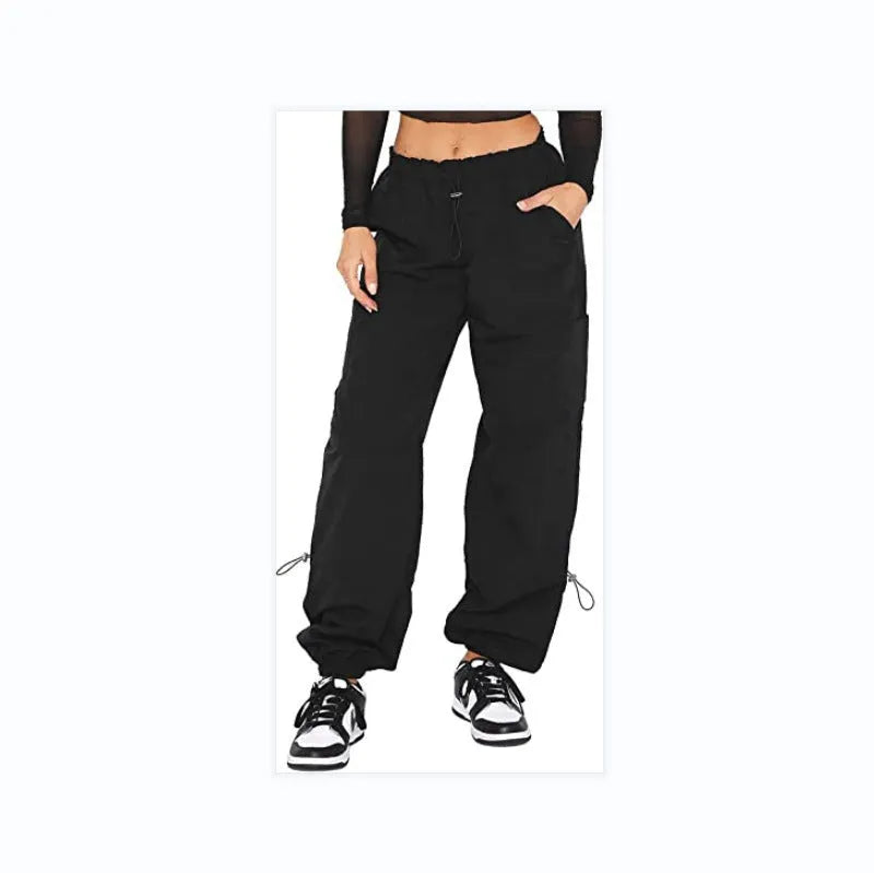 Men's loose-fit multi-pocket cargo casual trousers in polyester fabric on a hanger.