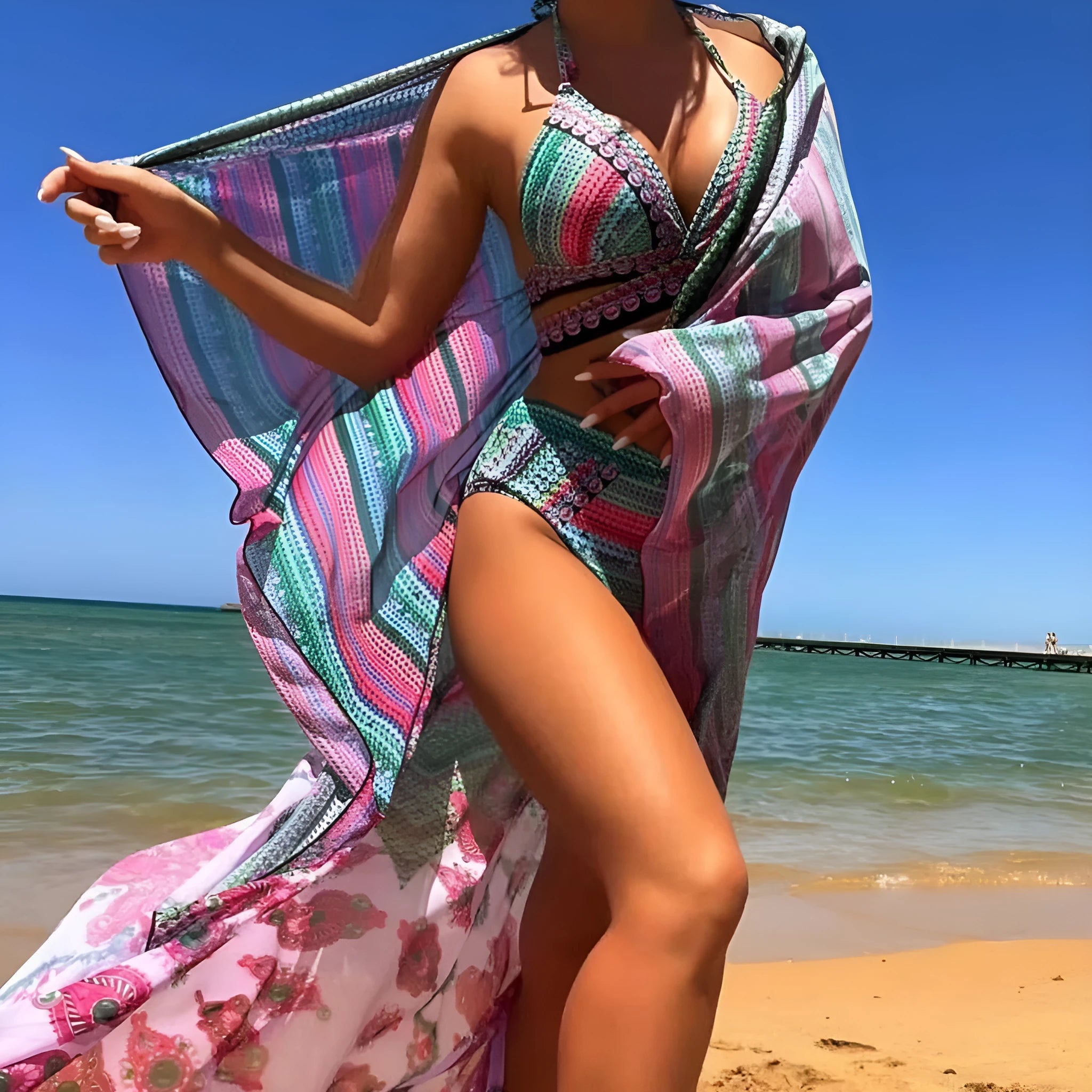 Women's blue high waist bandage bikini set with smock, bra, and briefs on a neutral background.