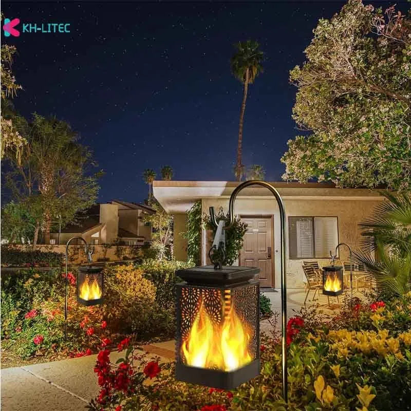 Set of four black solar-powered hanging garden lights with a flickering flame LED effect.