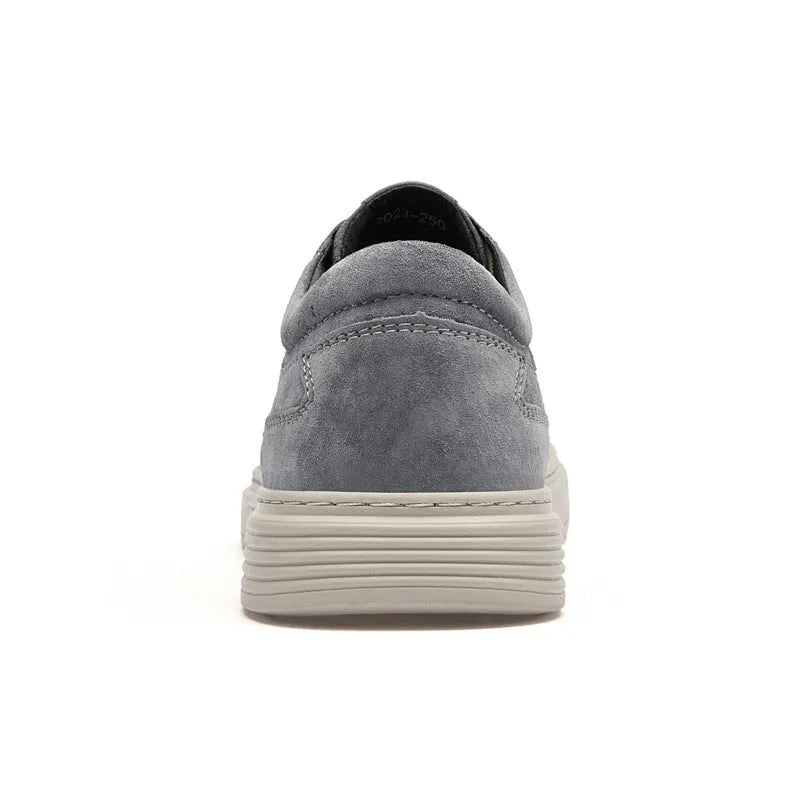 Men's grey casual leather skate shoes with rubber sole and lace-up design