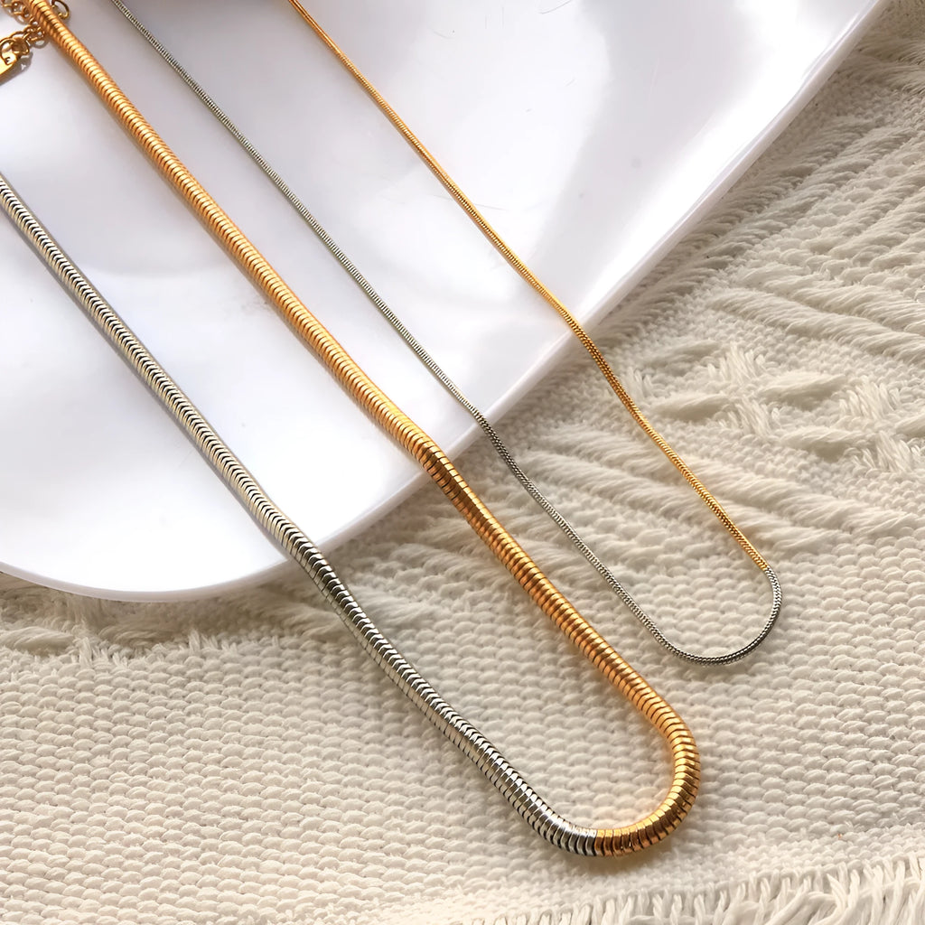 Golden 3mm snake bone chain necklace with geometric design for hip-hop fashion