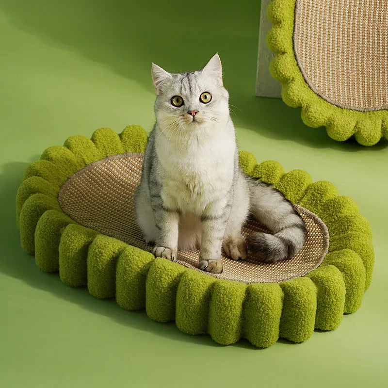 Green oval sisal cat scratch pad showing scratching surface and bowl-shaped lounging area