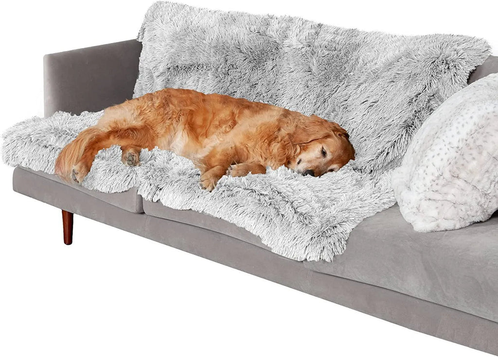 Plush waterproof dog cushion in dark grey, showing double-layer thickness on a wooden floor.