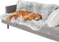 Plush waterproof dog cushion in dark grey, showing double-layer thickness on a wooden floor.