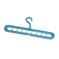 Green plastic nine-hole trousers hanger for wardrobe organisation with modern minimalist design
