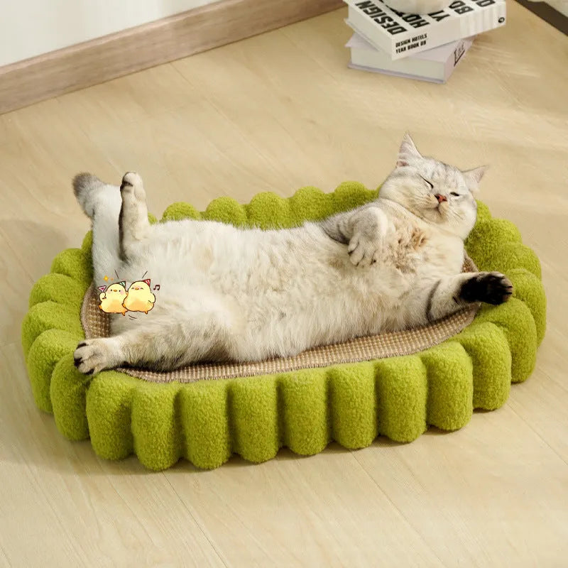 Green oval sisal cat scratch pad showing scratching surface and bowl-shaped lounging area