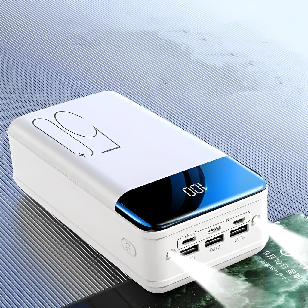 Large 50000mAh capacity power bank with three USB charging ports in black plastic case