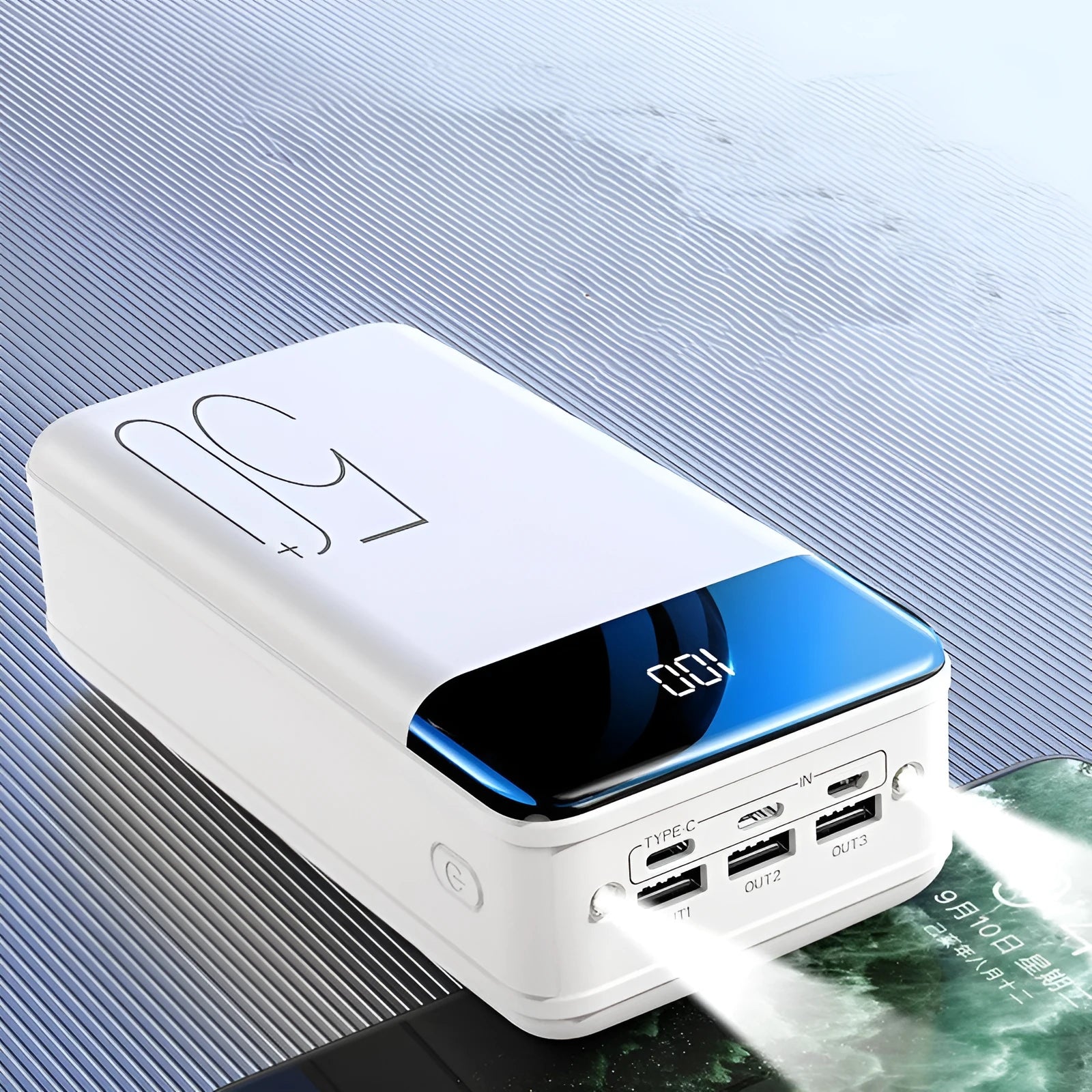 Large 50000mAh capacity power bank with three USB charging ports in black plastic case