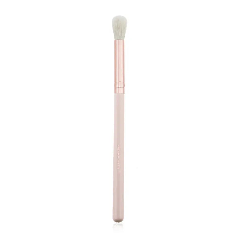 26 pink makeup brushes with wooden handles arranged in a PU carry case.