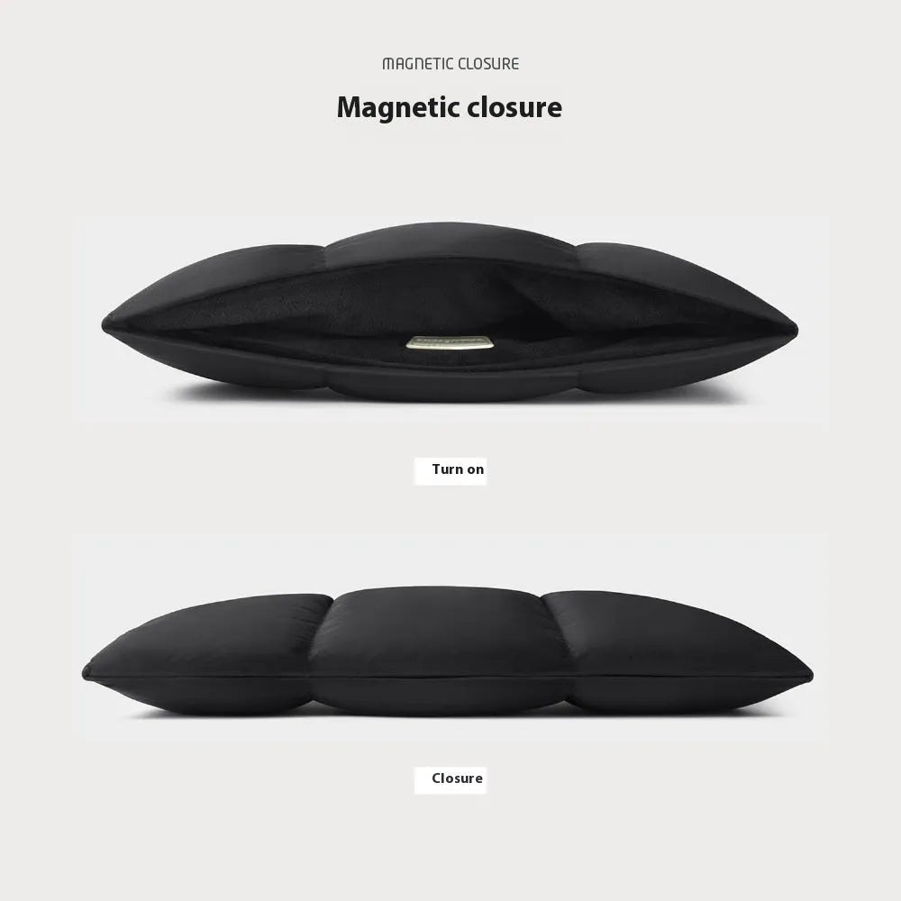 Soft fluffy black polyester laptop sleeve for 13 to 15.6 inch laptops with sewing thread details.