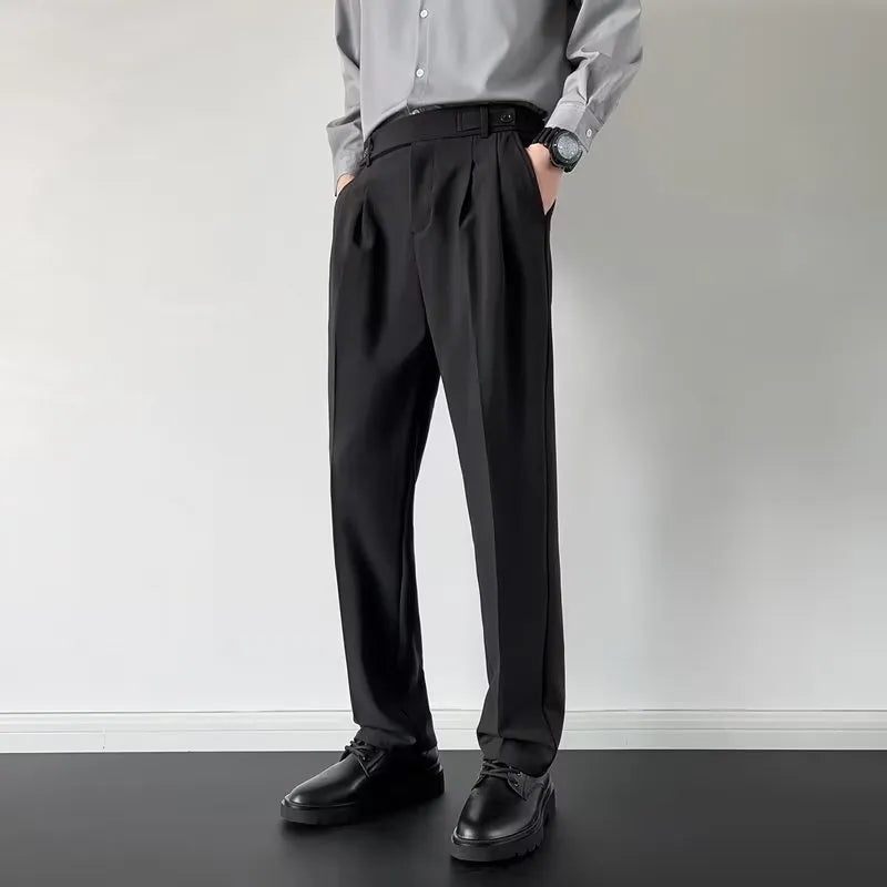 Man wearing straight loose fit suit trousers in apricot colour for formal or office setting