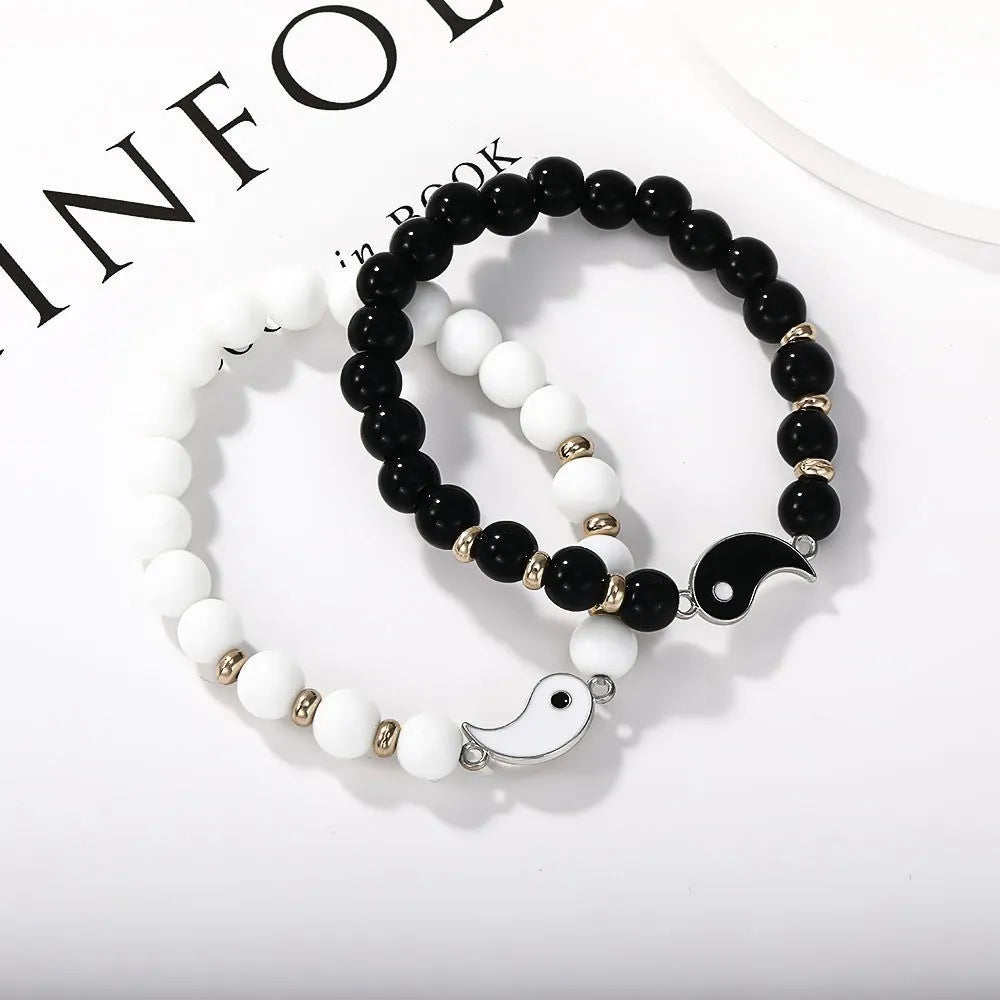 Geometric eight-diagram shaped alloy bracelet with electroplated finish in four colour variations