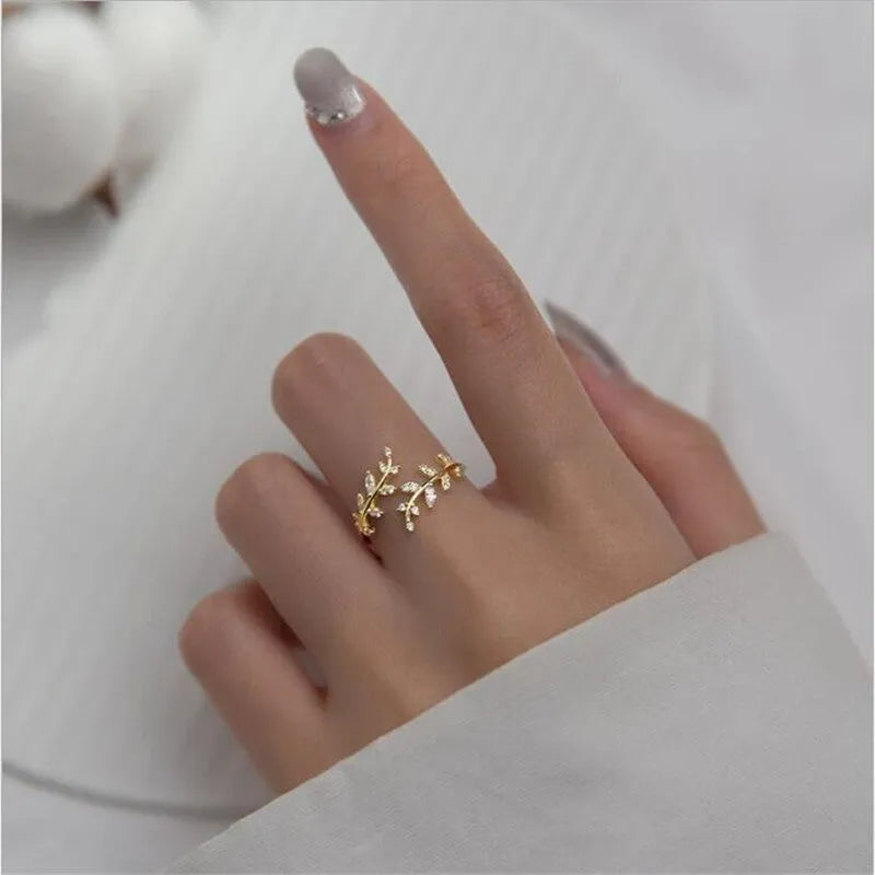 Women's copper leaf ring with geometric design in gold or silver electroplated finish
